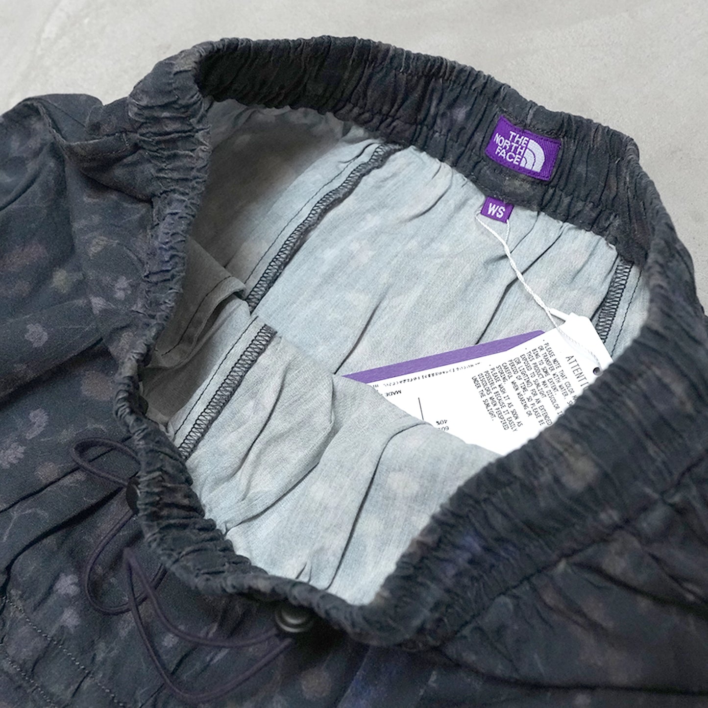 【THE NORTH FACE Purple Label】ノースフェイスパープルレーベル women's Flower Printed Field Tiered Skirt "Dark Navy"