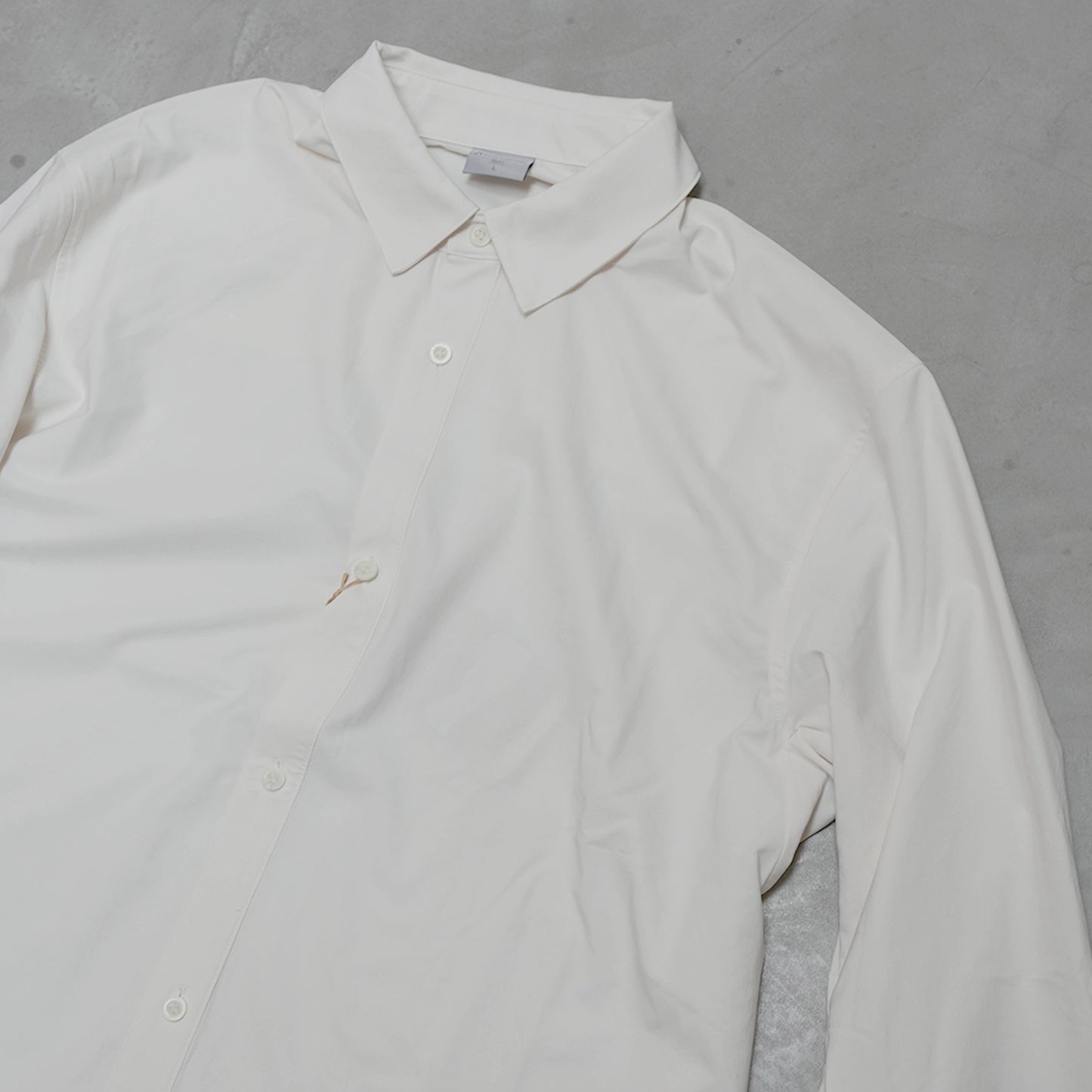 【HOUDINI】フーディニ men's Symbio Base Shirt "Paper White"