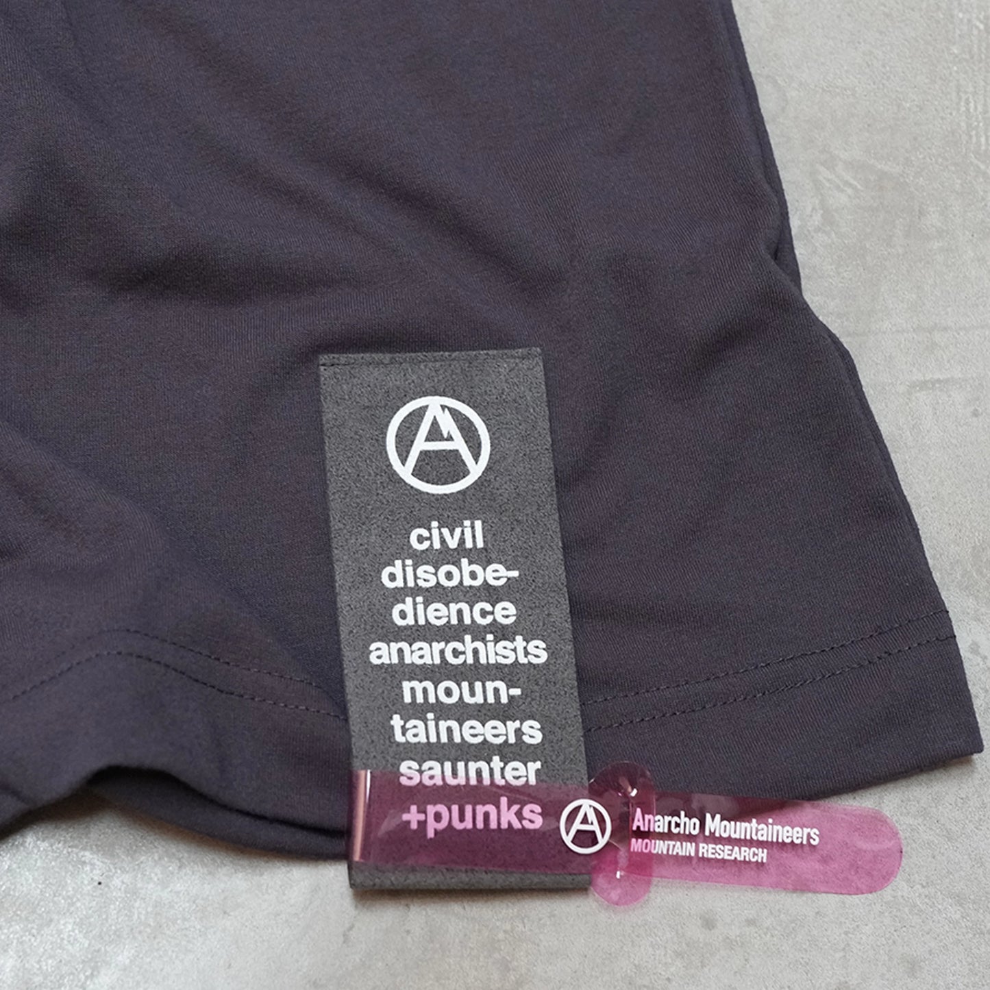 【Mountain Research】マウンテンリサーチ Punctured Letters Q.D. Tee "Black"