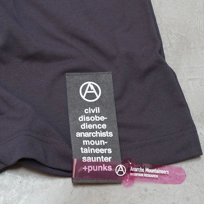 【Mountain Research】マウンテンリサーチ Punctured Letters Q.D. Tee "Black"