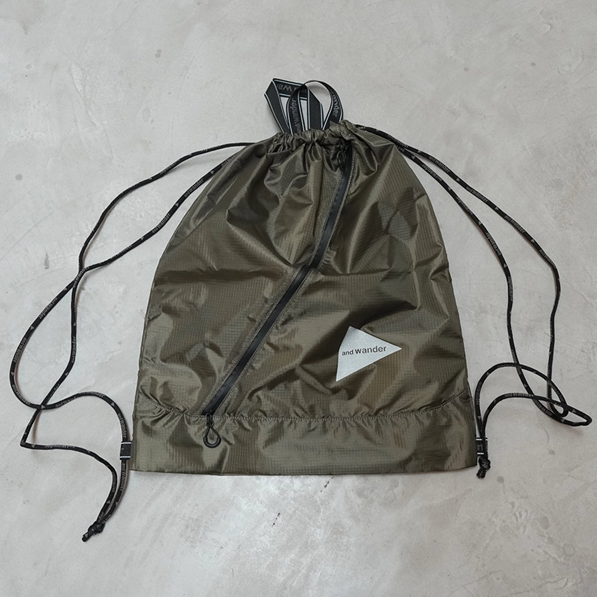 【and wander】アンドワンダー crispy rip drawstring bag "2Color" ※ネコポス可