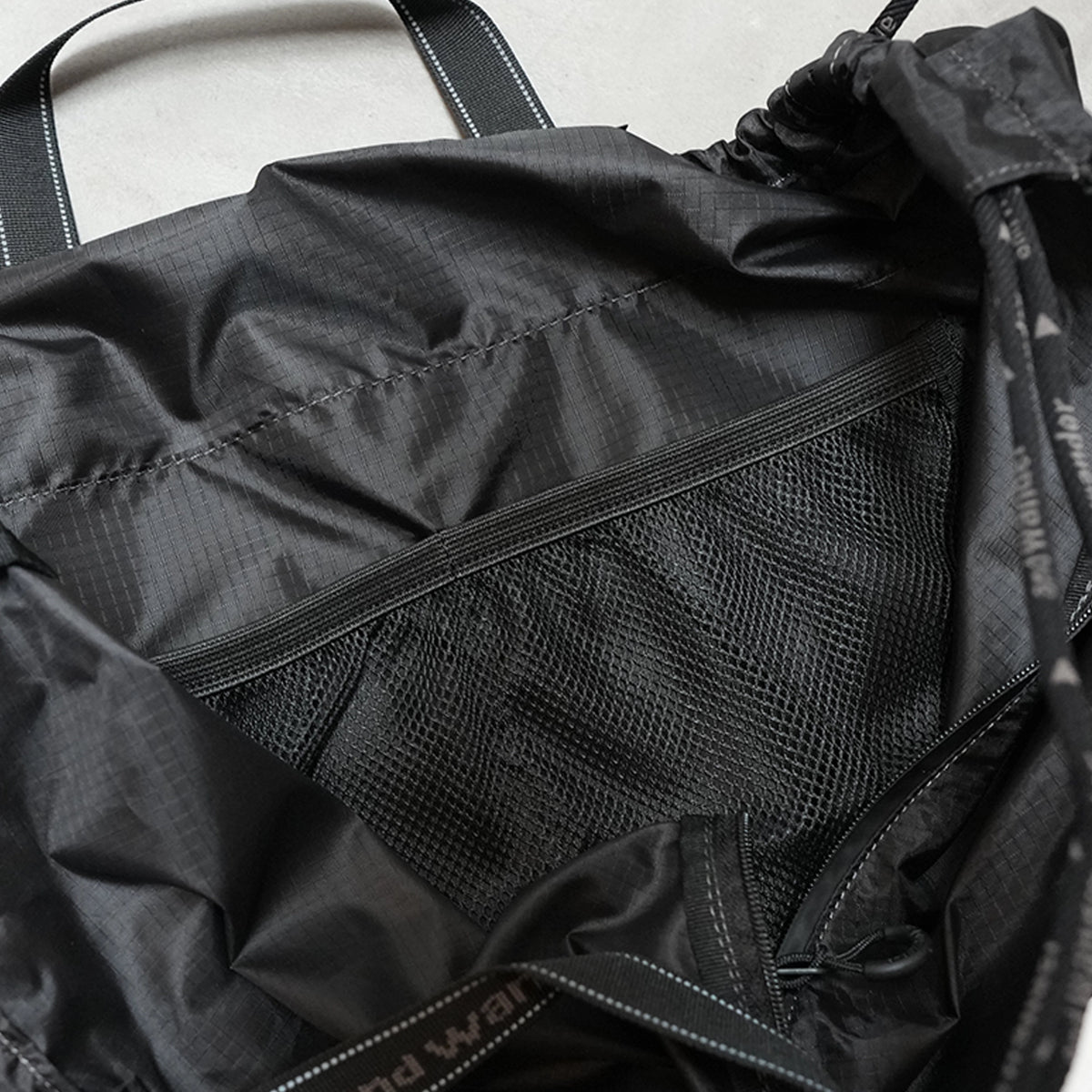 【and wander】アンドワンダー crispy rip drawstring bag "2Color" ※ネコポス可