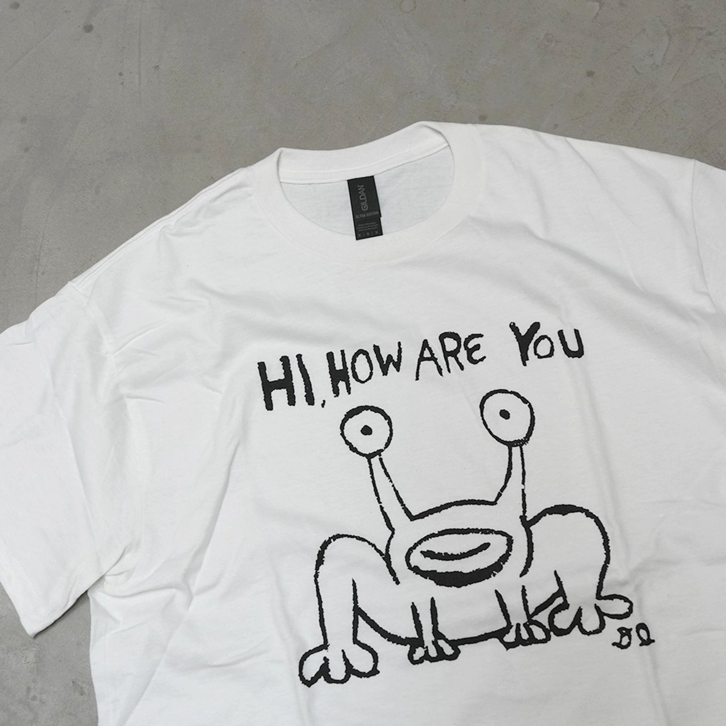 【DANIEL JOHNSTON】ダニエルジョンストン S/S Print Tee 'Hi How Are You Mural? "White" ※ネコポス可