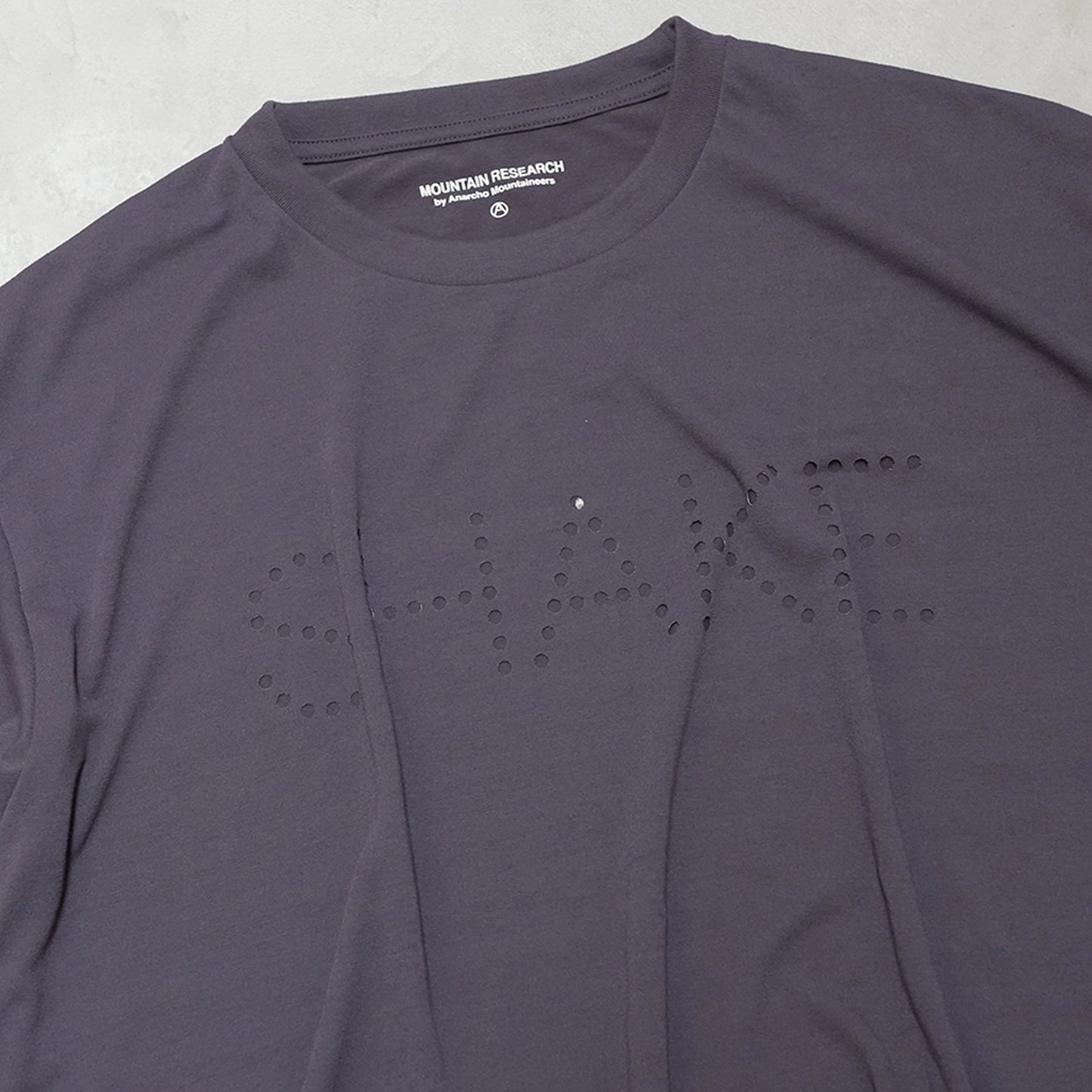 【Mountain Research】マウンテンリサーチ Punctured Letters Q.D. Tee "Black"