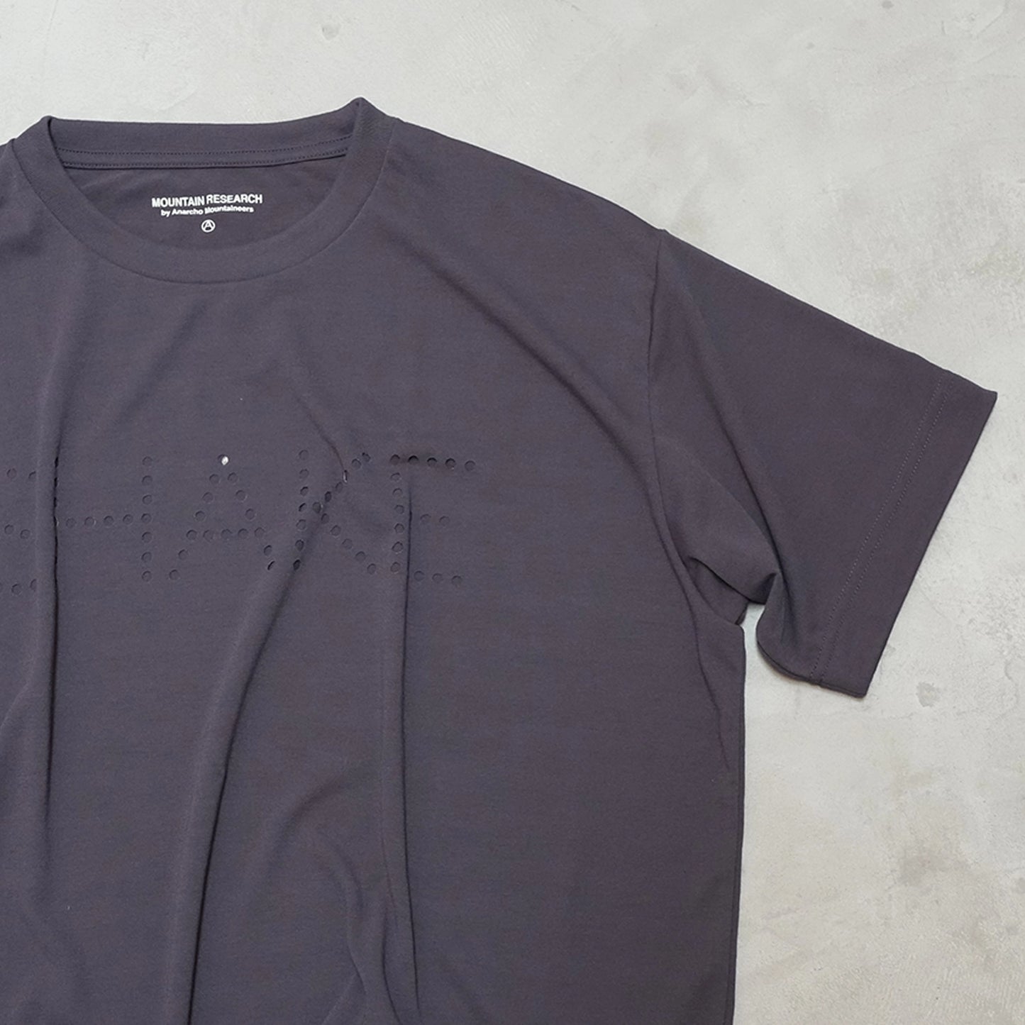 【Mountain Research】マウンテンリサーチ Punctured Letters Q.D. Tee "Black"