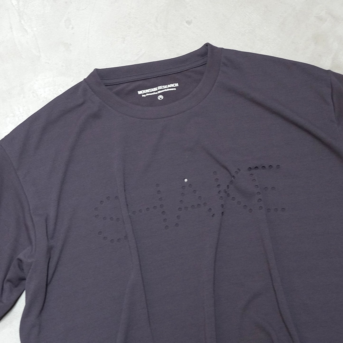 【Mountain Research】マウンテンリサーチ Punctured Letters Q.D. Tee "Black"